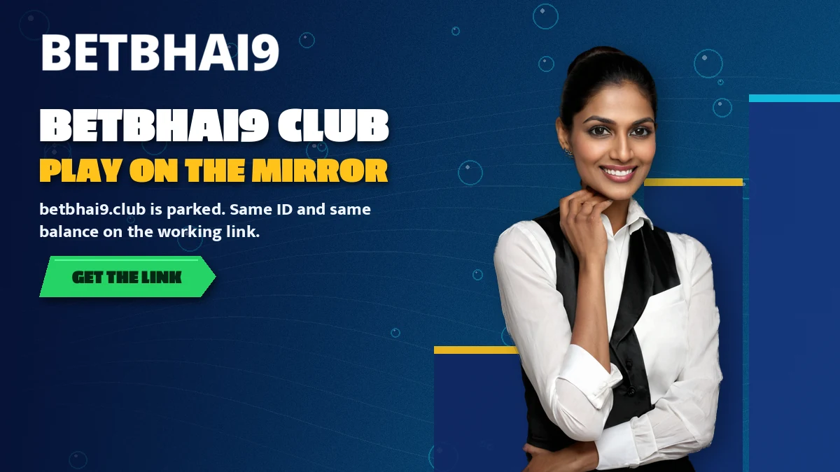 Smiling host holding a phone that shows the working Betbhai9 mirror instead of the parked club address