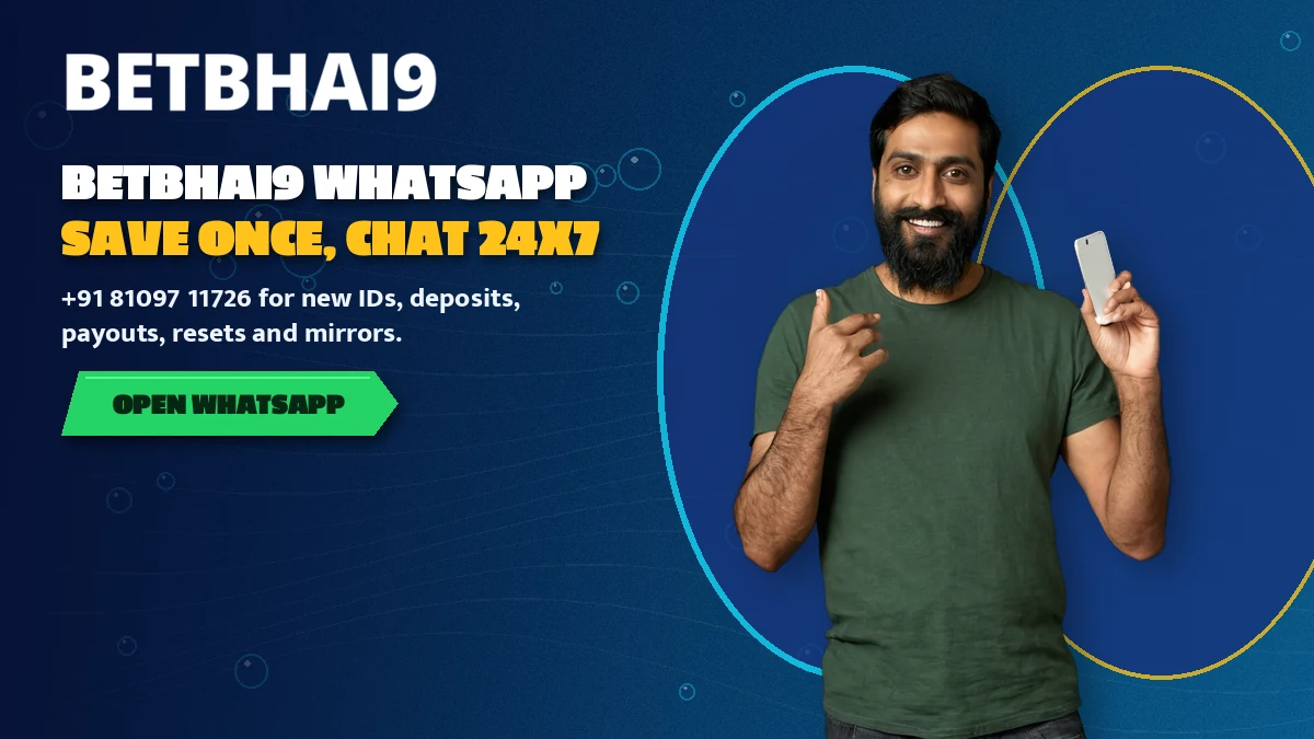 Smiling adult holding one phone with the Betbhai9 desk number saved as a WhatsApp contact