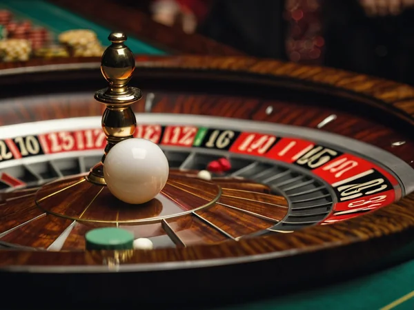 Roulette wheel spinning with the ball about to drop into a pocket